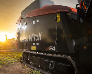 Ditch Witch JT24 horizontal directional drill at a jobsite during underground utility installation.